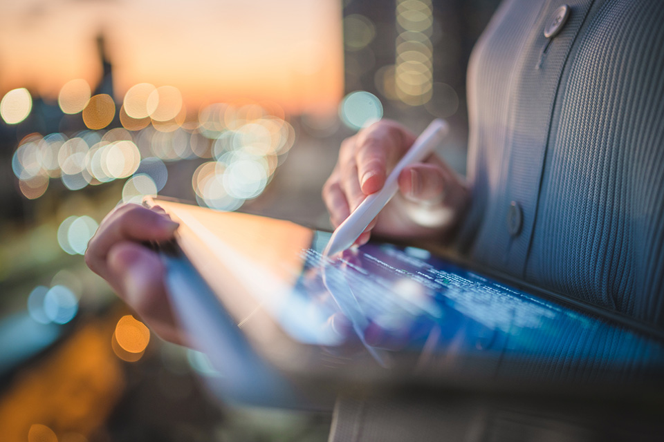 woman using tablet