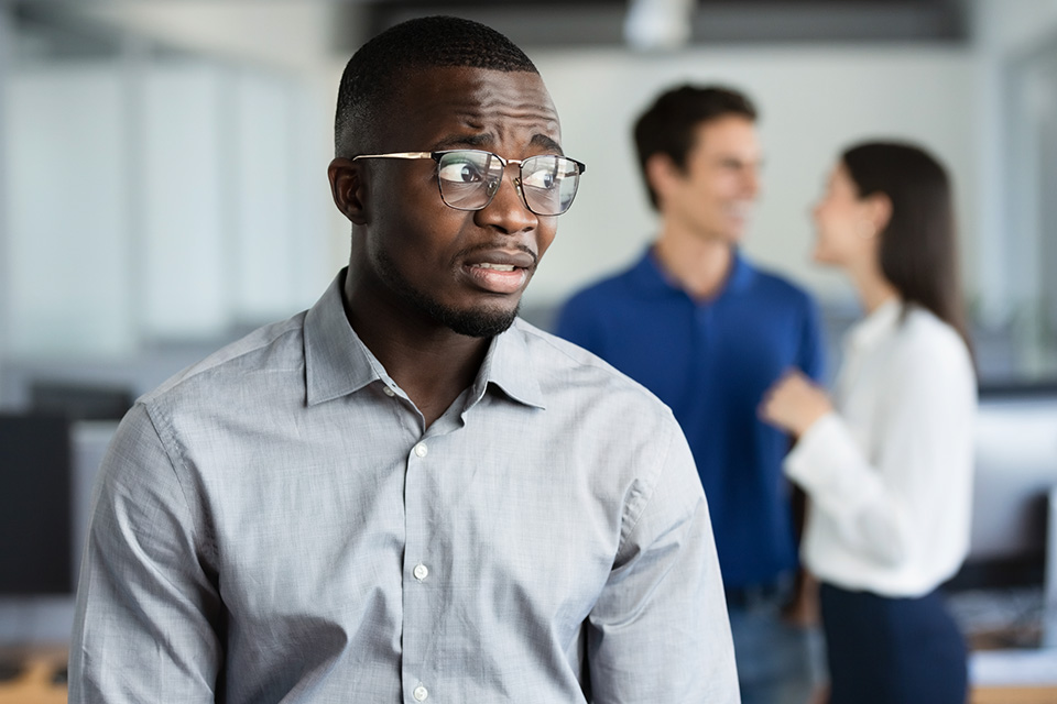 man looking sideways furtively